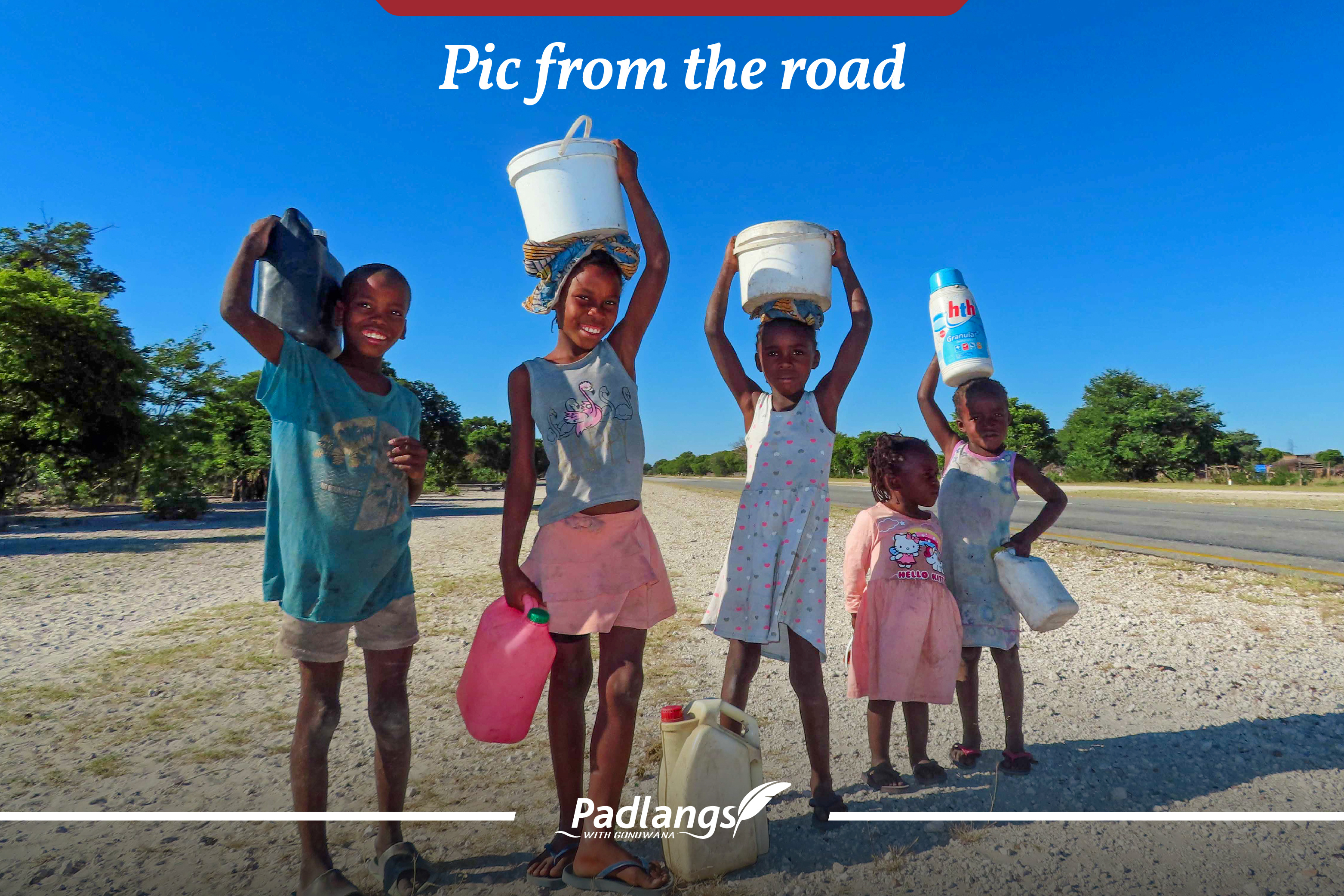 Happy children collecting water, Namibia