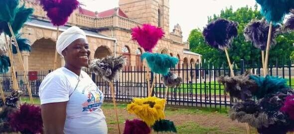Women selling Ostrich feather dusters in South Africa