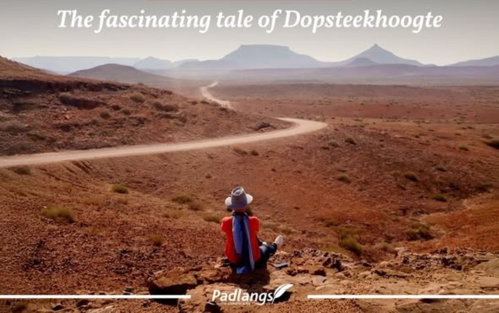 View from Dopsteekhoogte in Damaraland, Namibia, where farmers in 1957 shared a drink after a convoy accident, now a local tradition.