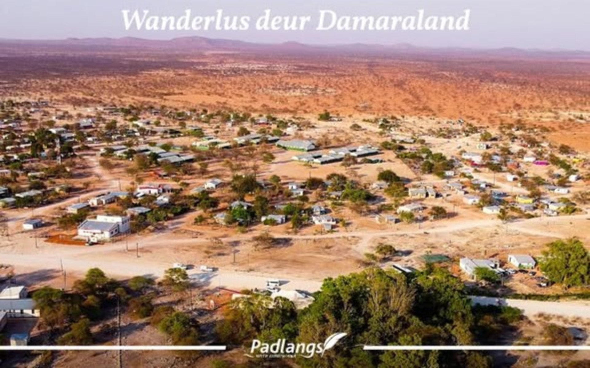 Community gathering in Fransfontein, north-western Namibia, celebrating Swartbooi history and cultural heritage amid arid landscapes and mopane woodland.